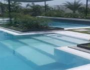 A house near a pool -- Condo & Townhome -- Quezon City, Philippines